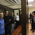 Ruslan Kostylenkov, Piotr Karamzin y Viacheslav Kriuko fueron condenados a entre seis y 7 años de prisión efectiva, mientras que Dmitri Poletaev recibió prisión en suspenso. (Kirill KUDRYAVTSEV / AFP)