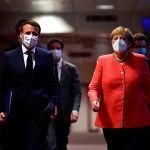 Emmanuel Macron y Angela Merkel (John Thys/Pool via REUTERS)